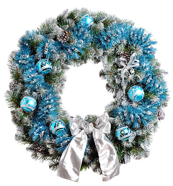 Christmas wreath with blue garland, ornaments and silver bow