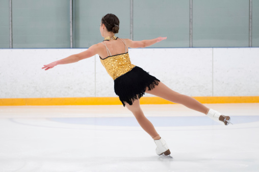 A figure skater practicing her skating