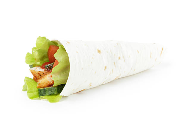 istock wheat tortilla with chicken and vegetables 452692589