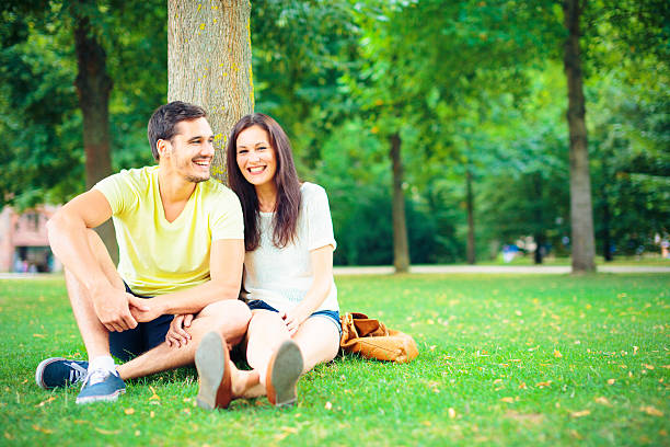 istock young people relaxing in the park 452695989