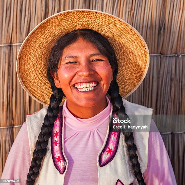 Portrait Of Happy Woman On Uros Floating Island Lake Tititcaca Stock Photo - Download Image Now