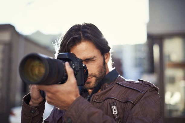 istock Focusing on his photography skills 452698111