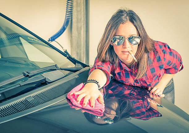 Young beautiful woman cleaning her Car at Carwash Young beautiful woman cleaning her Car at Carwash fine art portrait pin up girl glamour beauty stock pictures, royalty-free photos & images