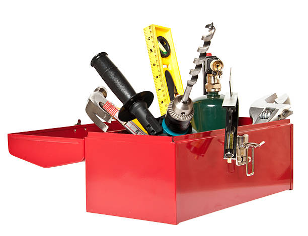 Red Tool Box Crammed with Variety of Home Improvement, Tools, Isolated on White