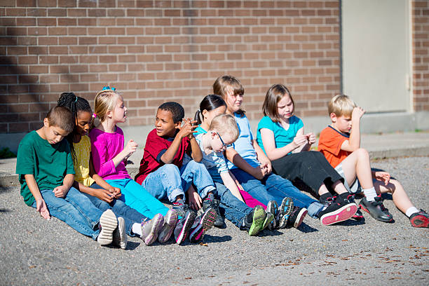 istock Hanging out in school yard 452699847