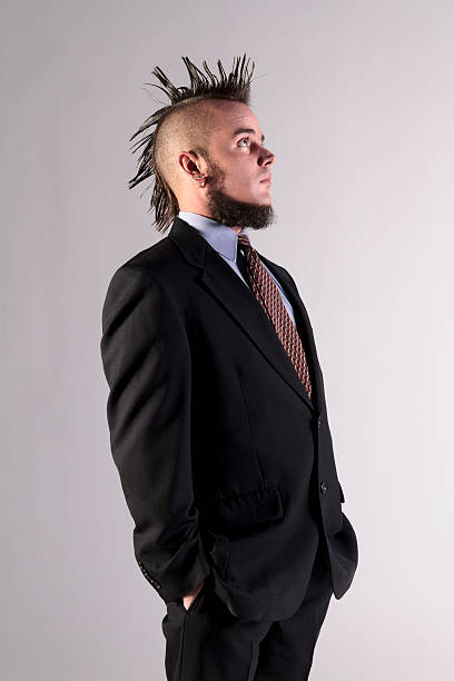 istock Man With Mohawk Pondering an Upcoming Job Interview 452708051