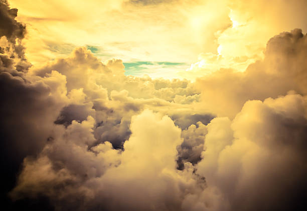 istock Clouds and sky as seen through window of an aircraft 452709323