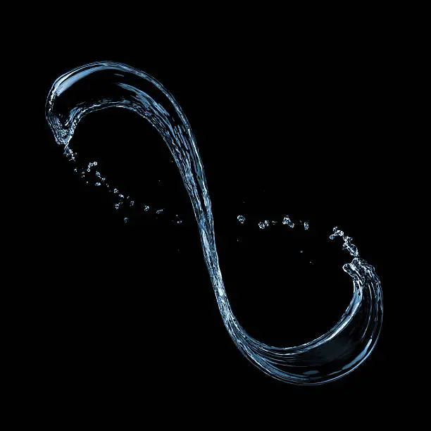 Photo of water splash isolated on black background