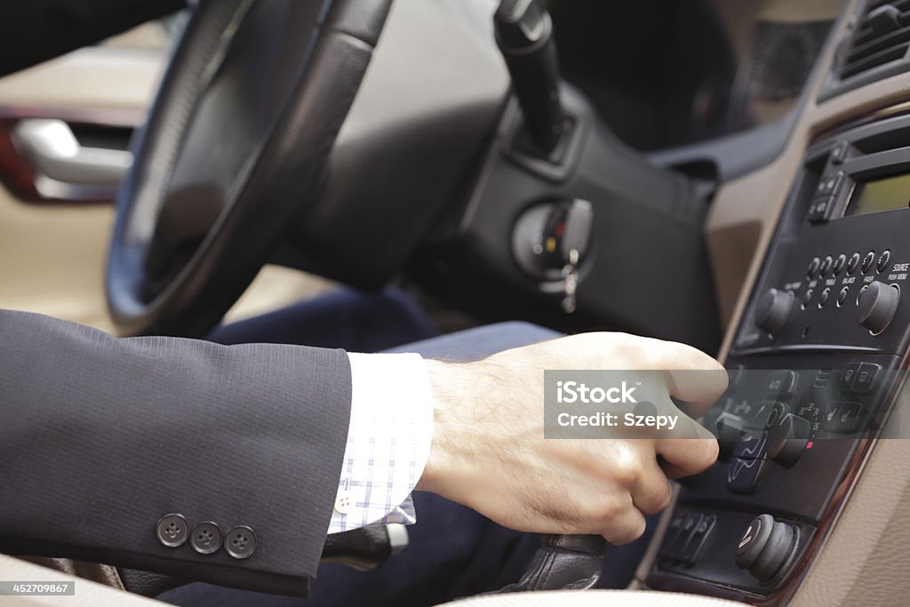 Driving a car Businessman driving a luxury car Adult Stock Photo