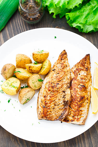 istock Fried mackerel with baked potato 452710555
