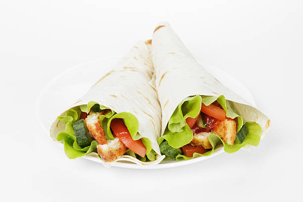istock wheat tortilla with chicken and vegetables 452712253