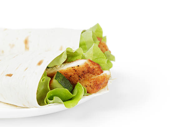 istock wheat tortilla with chicken and vegetables 452713497
