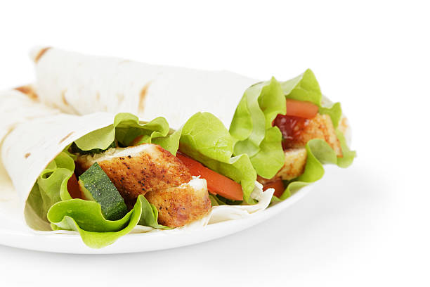 istock wheat tortilla with chicken and vegetables 452713503