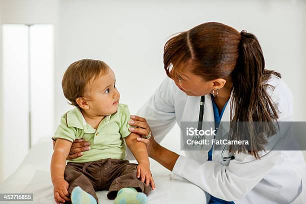 Pediatrition With Baby Boy Stock Photo - Download Image Now - 25-29 Years, 30-34 Years, Adult