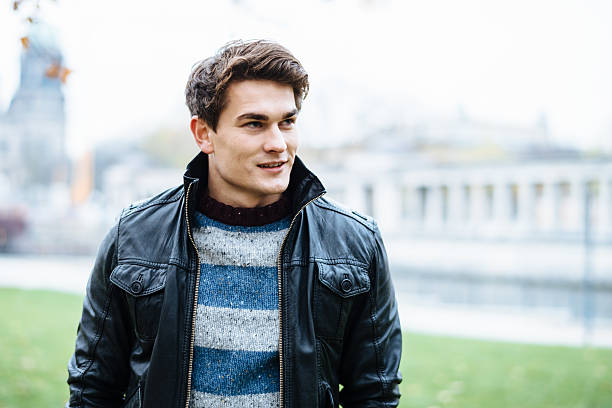 istock Man smiling over to his friends at Berlin Museumsinsel 452717183