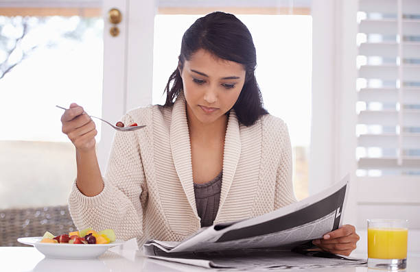 istock Catching up on the news 452718797