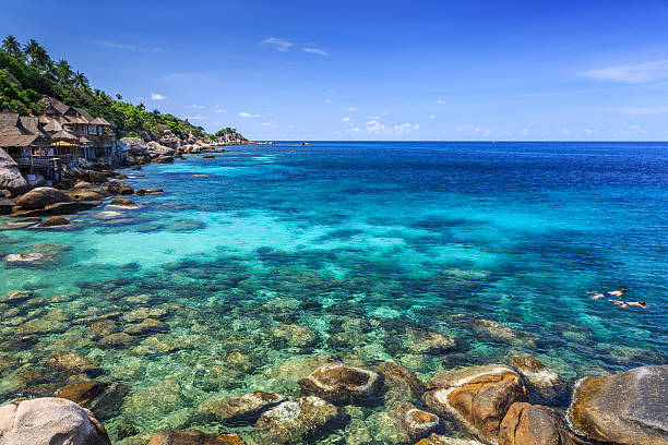 istock Couple snorkelling in crystal clear sea 452721317