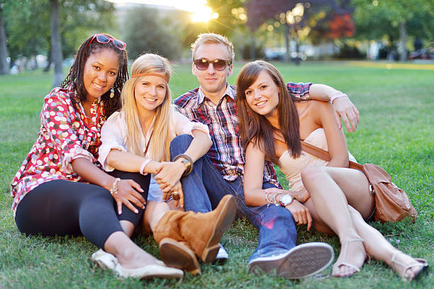 istock Young college students together in the park 452721671