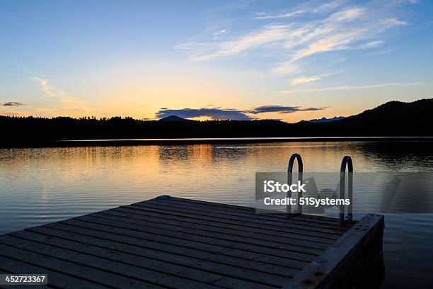 Dock At Sunset Stock Photo - Download Image Now - Back Lit, Color Image, Horizontal