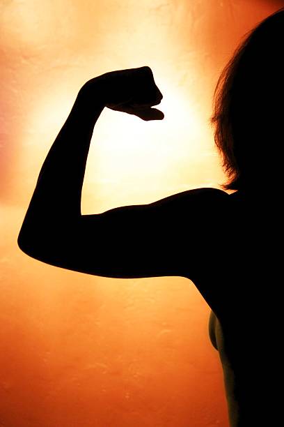 istock Healthy Woman Flexing 452724615