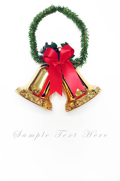 istock golden bells with a red bow for background 452725317