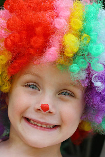 istock Happy Child in Clown Costume 452728929