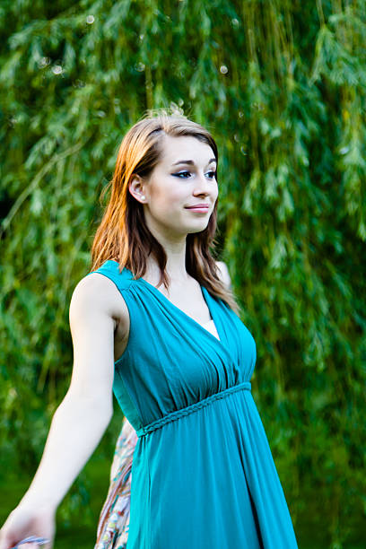 istock Happy Beautiful Girl Smiling in a Park 452729297