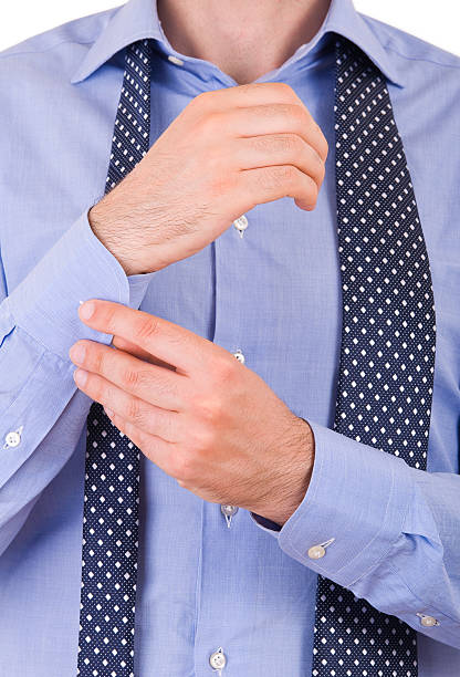 istock Businessman buttoning his sleeve. 452730987
