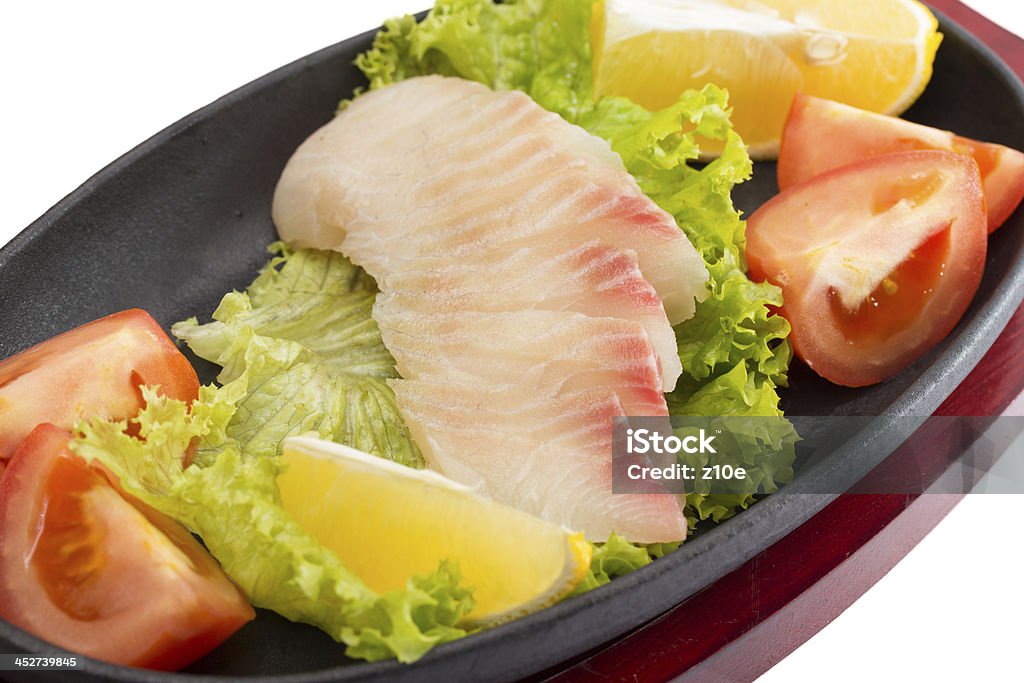 perch with vegetables on plate isolated Appetizer Stock Photo