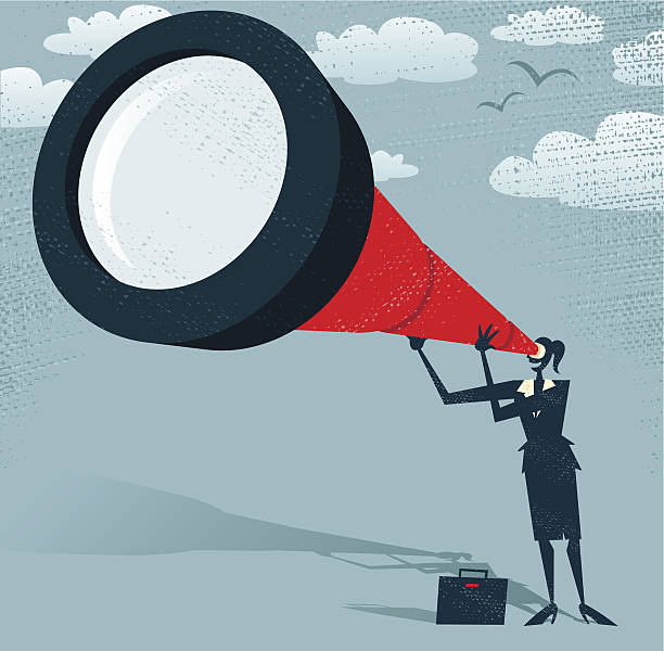 istock Abstract Businesswoman looks through her Telescope. 452740647