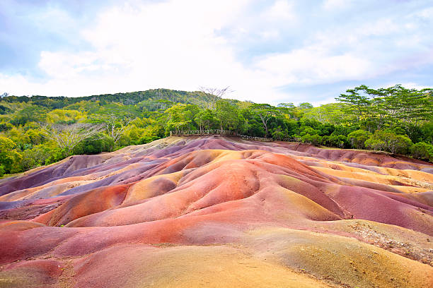 A scenic view of Chamarel Seven Colored Earths in yellow stock photo