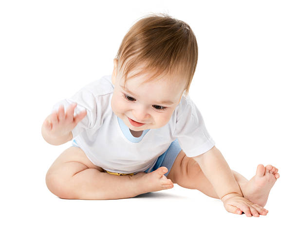 istock child takes something on the floor 452745183