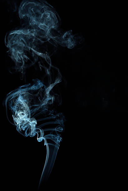 istock Rising smoke forming shapes on black background 452746399
