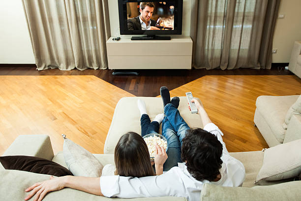 istock Overhead image of a couple watching a movie 452760933