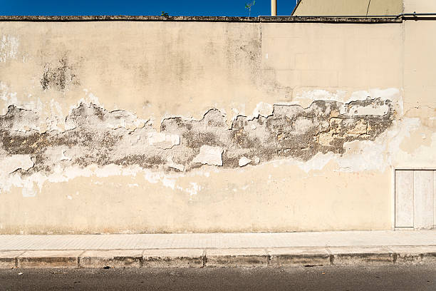 istock Old concrete grunge wall with sidewalk 452761189