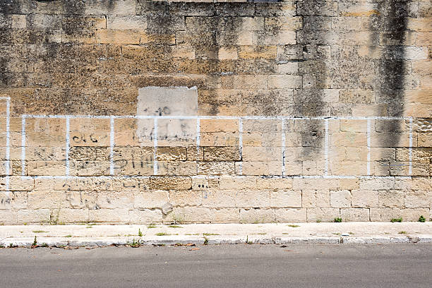 istock Old concrete grunge wall with sidewalk 452761223