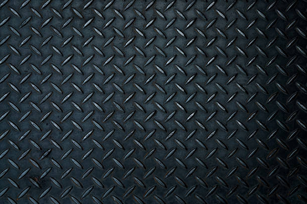 istock Black diamond steel plate close-up 452761257