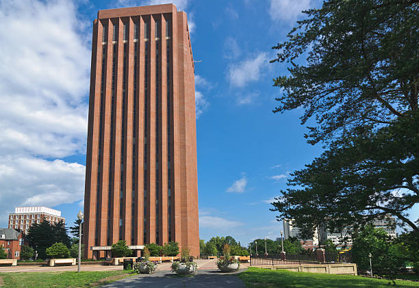 UMass Amherst Library One of four libraries on the University of Massachusetts Amherst campus, the W.E.B. Dubois Library is the largest.  Containing over 3.6 million volumes, this library is at 28 stories and 296 feet tall, it is the 2nd tallest library in the world, and it is the tallest university library in the world university of massachusetts amherst stock pictures, royalty-free photos & images