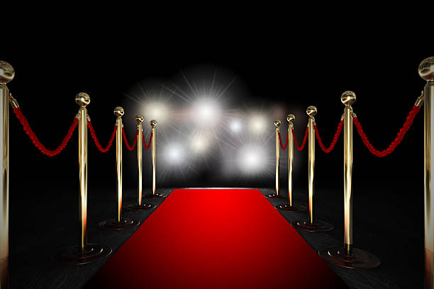 Rope barrier with red carpet and flash light Red carpet between two rope barriers and flash light red carpet event photos stock pictures, royalty-free photos & images