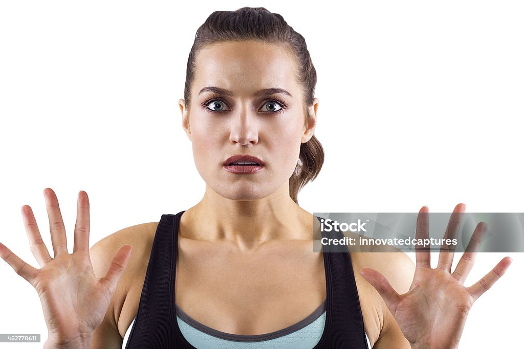 Frustrato giovane donna Fitness Trainer con Lei le mani - Foto stock royalty-free di Abbigliamento sportivo