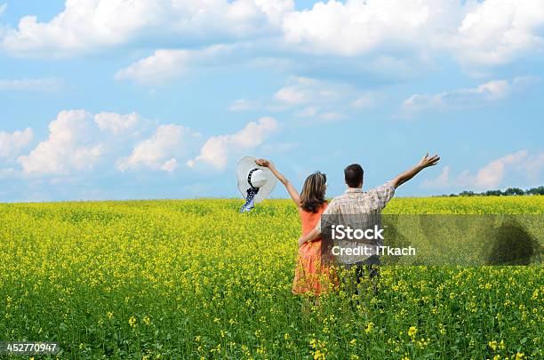 Back View Of Amorous Couple Stock Photo - Download Image Now - Adult, Blue, Copy Space