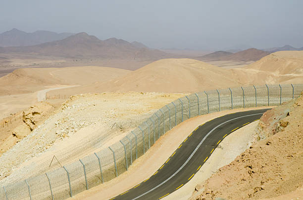 Isreale-Egypt border fence Isreale-Egypt border fence. israel egypt border stock pictures, royalty-free photos & images