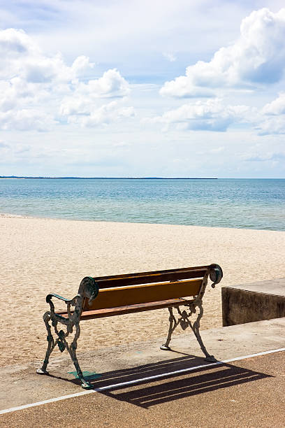 istock Beach and bench in sunny day 452772087