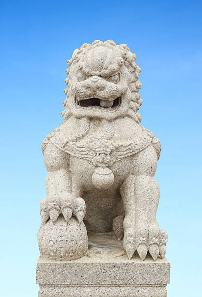 istock Chinese Imperial Lion Statue with sky 452773333