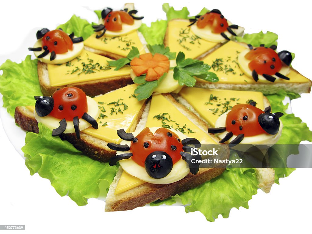 creative vegetable sandwich with cheese creative sandwich with cheese and lady bugs made of tomato Appetizer Stock Photo