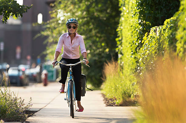 istock Bicycle Commuter in The City Riding Home From Work. 452781065