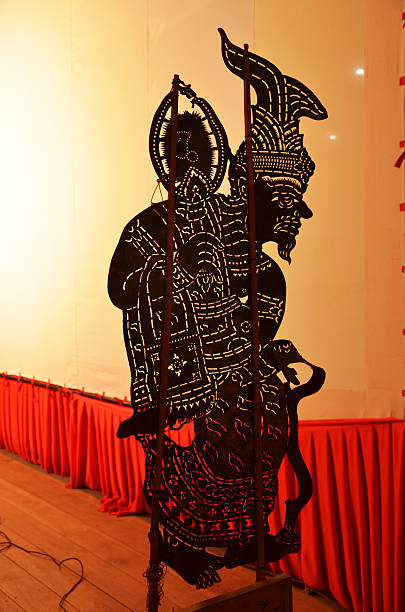 istock Grand shadow play at Wat Khanon RatchaBuri Thailand 452781083