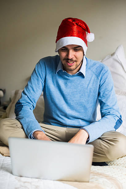 istock elegant business multitasking christmas man at home 452792825