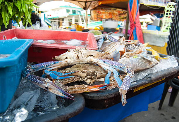istock blue crab on a market 452794313
