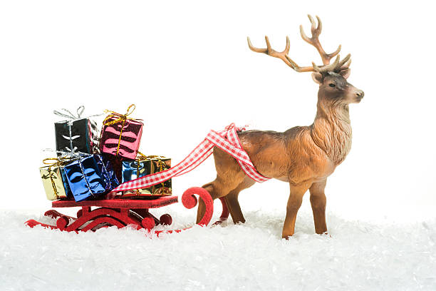 istock christmas gifts on sledge 452797209